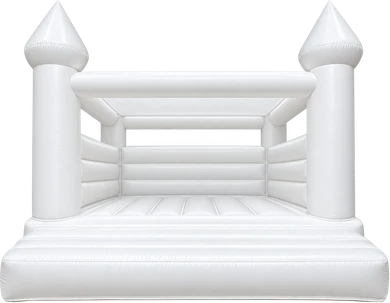 White bounce castle set up on grass in South Florida